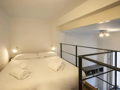 Cama o camas de una habitación en San Leandro de Sevilla Oasis en el centro