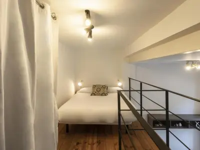 Cama o camas de una habitación en San Leandro de Sevilla Oasis en el centro