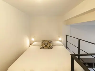 Cama o camas de una habitación en San Leandro de Sevilla Oasis en el centro