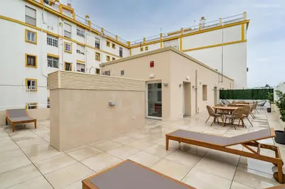 Un balcón o terraza de Limehome Sevilla Ronda de Capuchinos
