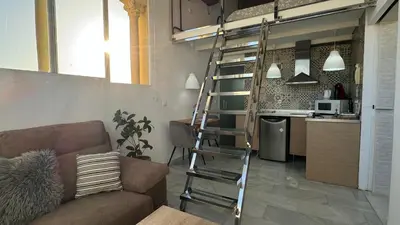 Una cocina o zona de cocina en Ático de la Sultana con terraza privada