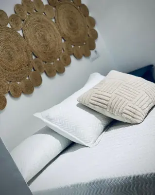 Cama o camas de una habitación en Alojamientos El Carmen