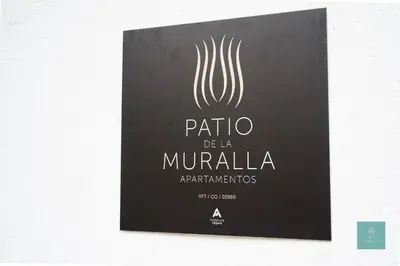 Certificado, premio, señal o documento que está expuesto en PATIO DE LA MURALLA APARTAMENTOS