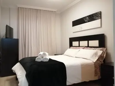 Cama o camas de una habitación en Apartamento La Muralla II