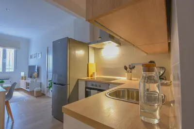 Una cocina o zona de cocina en AROMA APARTAMENTO OLVERA