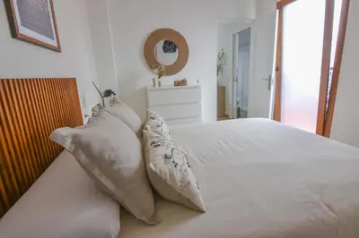 Cama o camas de una habitación en AROMA APARTAMENTO OLVERA