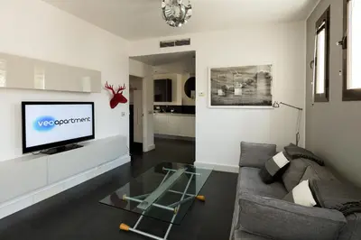 Una televisión o centro de entretenimiento en Veoapartment Relator Terraza