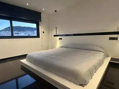 Cama o camas de una habitación en Casa Bulevar - Exclusiva casa muy moderna en zona tranquila
