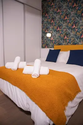 Cama o camas de una habitación en Santa Catalina Suites