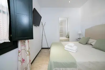 Cama o camas de una habitación en Alohamundi Lumbreras II
