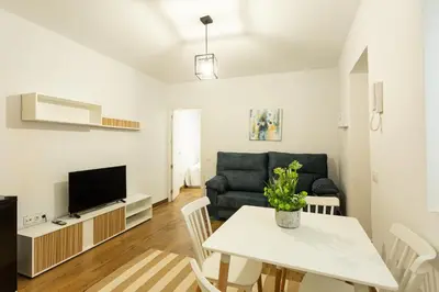Una televisión o centro de entretenimiento en WISH SUITE AMPARO DE SEVILLA