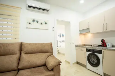 Una cocina o zona de cocina en WISH SUITE AMPARO DE SEVILLA