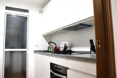 Una cocina o zona de cocina en NightInSevilla Juglar Free parking