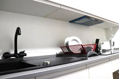 Una cocina o zona de cocina en NightInSevilla Juglar Free parking