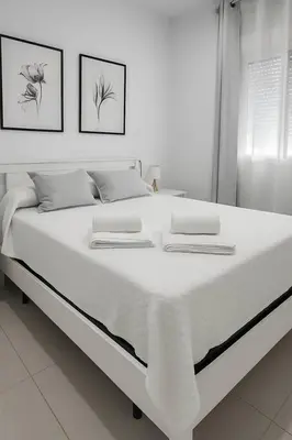 Cama o camas de una habitación en Alojamiento Baeza California 2B