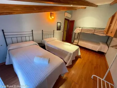 Cama o camas de una habitación en Casa Rural El Junquillo