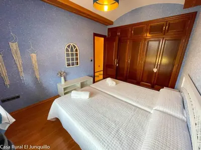 Cama o camas de una habitación en Casa Rural El Junquillo