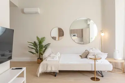 Cama o camas de una habitación en ISG Apartments Faustino 45