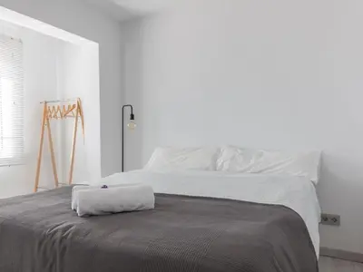 Cama o camas de una habitación en Ático de ensueño en el Corazón de Sevilla Wifi AC