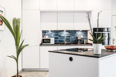 Una cocina o zona de cocina en Ático de ensueño en el Corazón de Sevilla Wifi AC