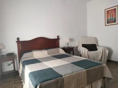 Cama o camas de una habitación en Chalet Rafael Constantina