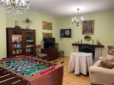 Una televisión o centro de entretenimiento en Finca Rural La Calderera