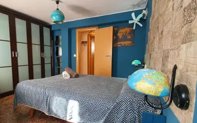 Cama o camas de una habitación en Apartamento El Mundo como Destino - cerca Estadio Cartuja
