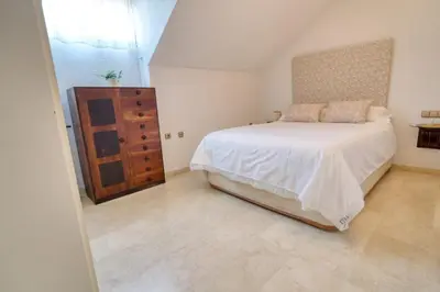 Cama o camas de una habitación en Dúplex en centro, San Ildefonso