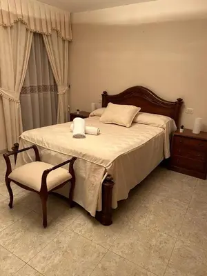 Cama o camas de una habitación en Casa Ancá Los Abuelos