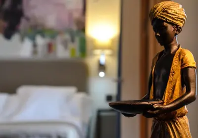 Cama o camas de una habitación en Aguilas5 SevillaSuites