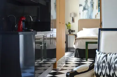 Una cocina o zona de cocina en Aguilas5 SevillaSuites
