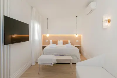 Cama o camas de una habitación en ISG Apartments Faustino 45-3