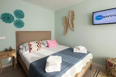 Cama o camas de una habitación en Veoapartment Menéndez Pelayo