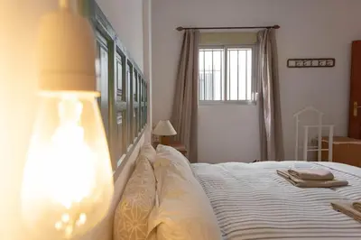 Cama o camas de una habitación en Town house with rooftop terrace