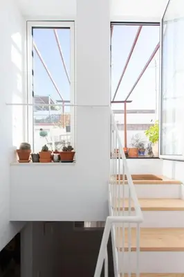 Un balcón o terraza de Town house with rooftop terrace