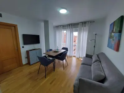 Una televisión o centro de entretenimiento en PLAZA DEL AYUNTAMIENTO con PARKING B&A