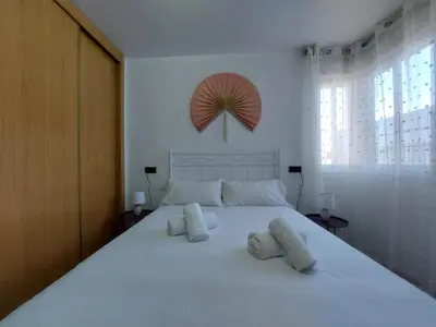 Cama o camas de una habitación en Apartamento CentroLinares Con Parking
