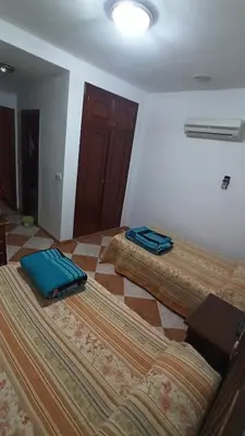 Cama o camas de una habitación en Hostal Algaidas