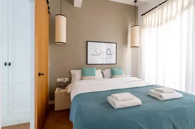 Cama o camas de una habitación en G8 Casa San Bernardo Calle Guadaira