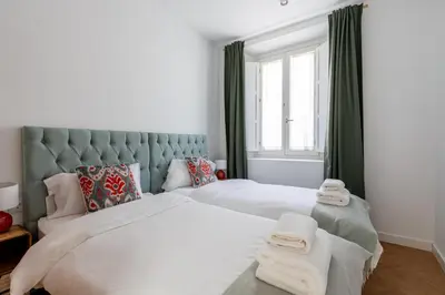 Cama o camas de una habitación en G8 Casa San Bernardo Calle Guadaira