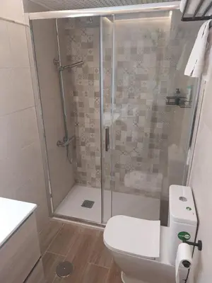 Un baño de Apart Gran Teatro Centro