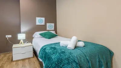 Cama o camas de una habitación en Apartamento Sueños del Guadalquivir Centro Cordoba