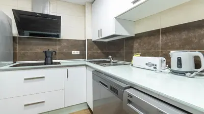 Una cocina o zona de cocina en Apartamento Sueños del Guadalquivir Centro Cordoba
