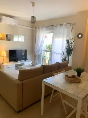Una televisión o centro de entretenimiento en Ático cielo de la Macarena