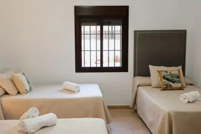 Cama o camas de una habitación en Casa Rural Alés