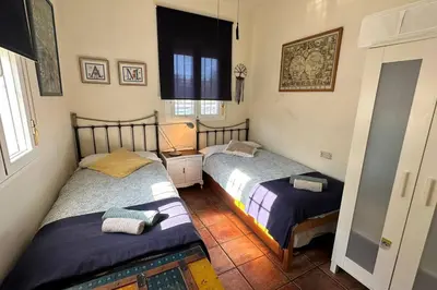 Cama o camas de una habitación en Casa rural de encanto en plena Serranía de Ronda