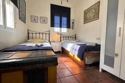 Cama o camas de una habitación en Casa rural de encanto en plena Serranía de Ronda