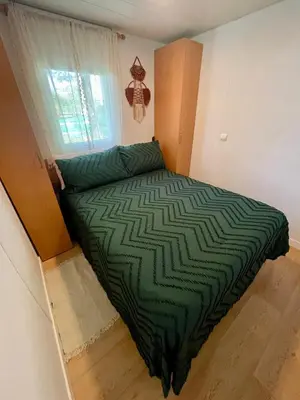 Cama o camas de una habitación en Nómada, Casa Cerca de Sevilla