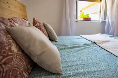 Cama o camas de una habitación en EL MIRADOR