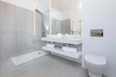 Un baño de BHost - Lumière Suites